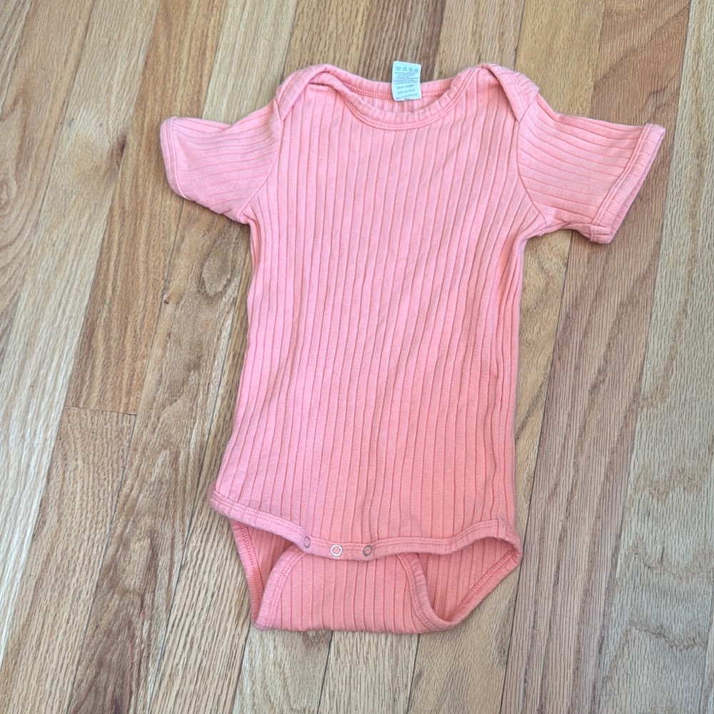Kate Quinn Peach Ribbed Bodysuit